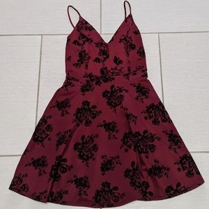 Maroon dress with black flowers, size medium